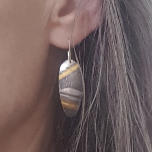 other earring being worn