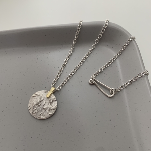 erba pendant with 18ct gold